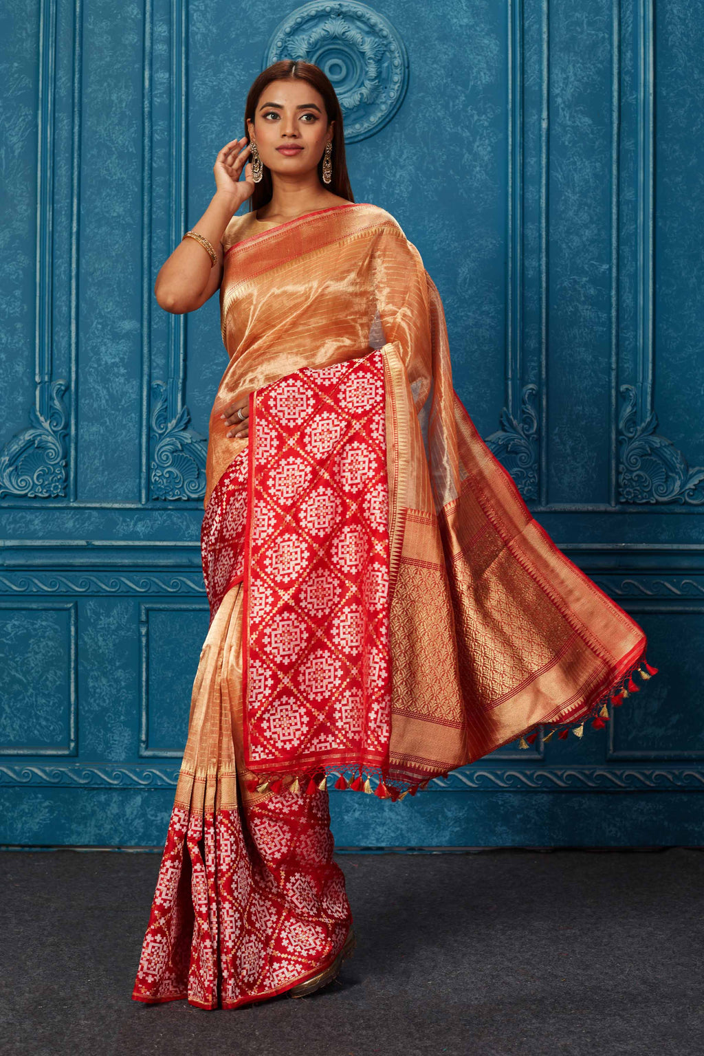 Shop golden Banarasi saree online in USA with red zari border. Look your best on festive occasions in latest designer sarees, pure silk saris, Kanchipuram silk sarees, handwoven sarees, tussar silk sarees, embroidered sarees from Pure Elegance Indian saree store in USA.-full view