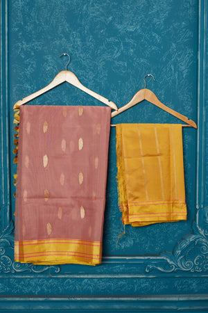 Shop dusty pink Banarasi saree online in USA with yellow zari minakari border. Look your best on festive occasions in latest designer sarees, pure silk saris, Kanchipuram silk sarees, handwoven sarees, tussar silk sarees, embroidered sarees from Pure Elegance Indian saree store in USA.-blouse
