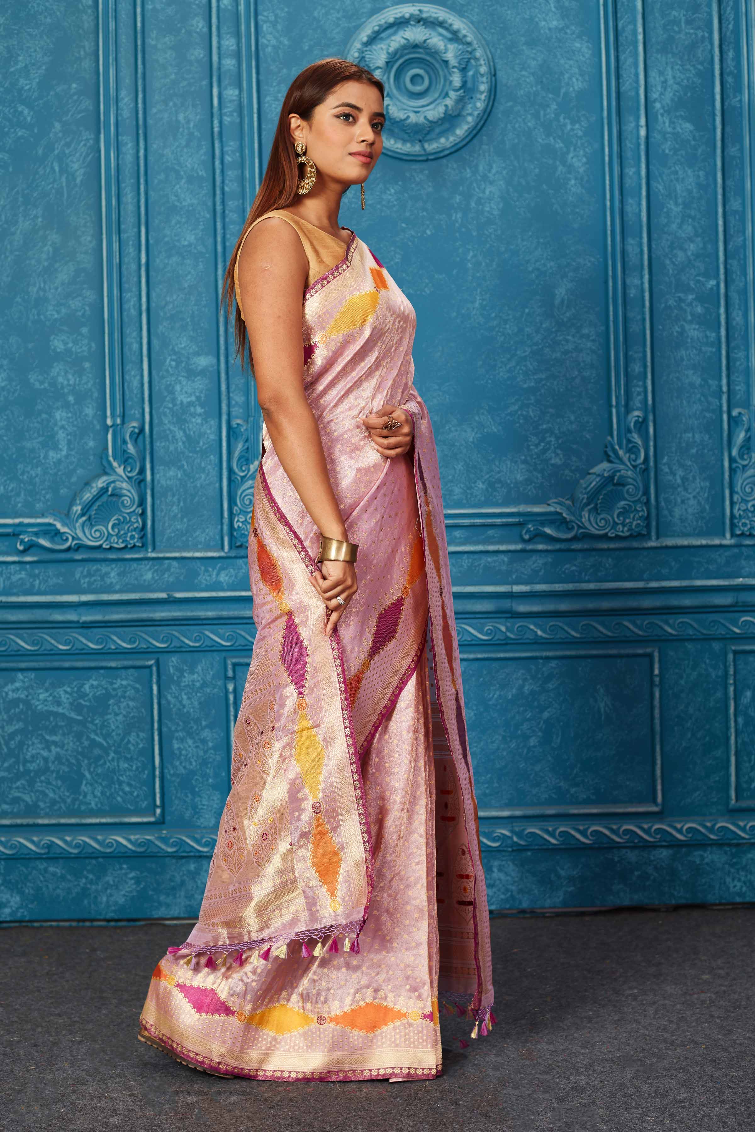 Shop stunning lilac Banarasi saree online in USA with zari border. Look your best on festive occasions in latest designer sarees, pure silk saris, Kanchipuram silk sarees, handwoven sarees, tussar silk sarees, embroidered sarees from Pure Elegance Indian saree store in USA.-side