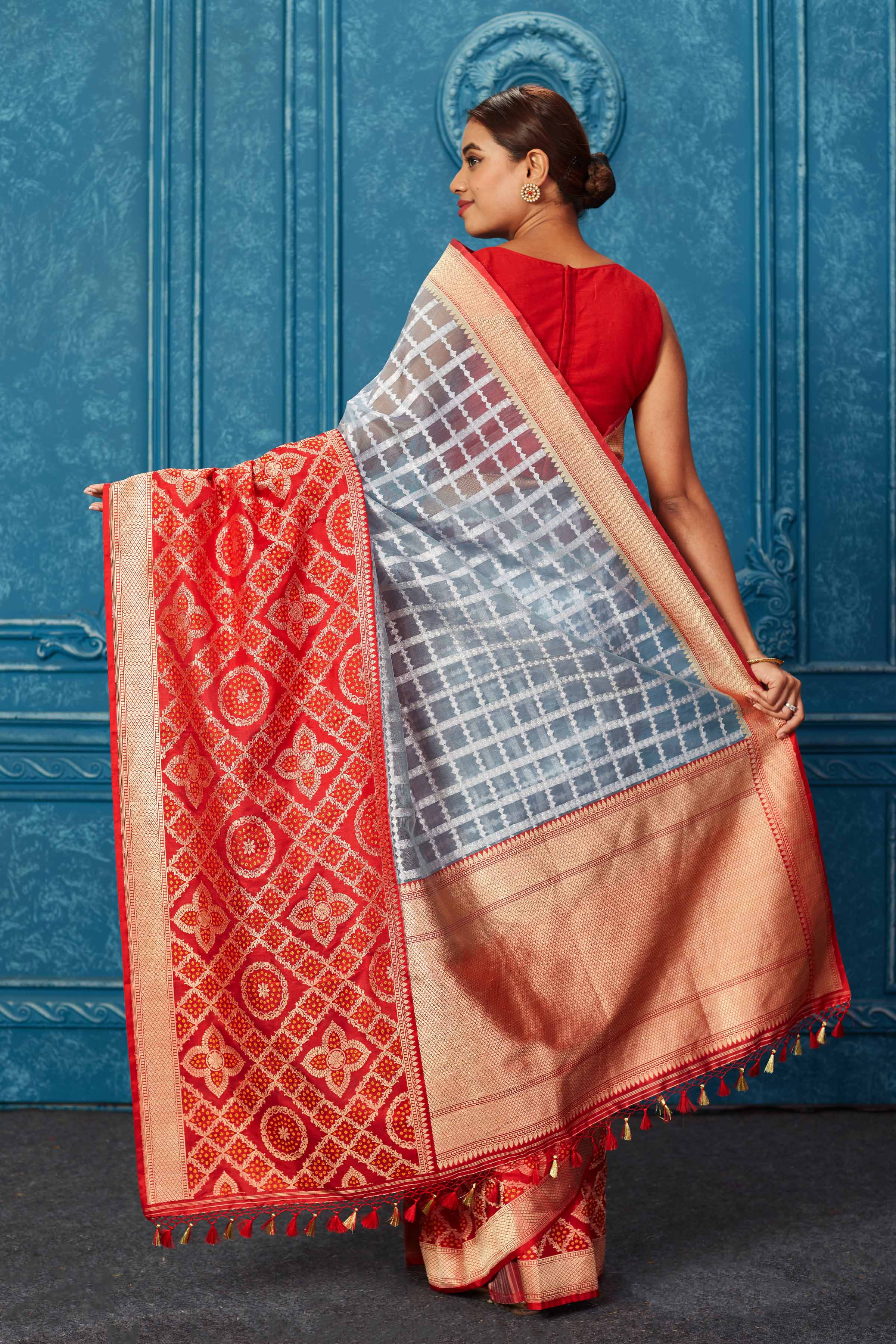 Buy powder blue check Banarasi saree online in USA with red zari border. Look your best on festive occasions in latest designer sarees, pure silk saris, Kanchipuram silk sarees, handwoven sarees, tussar silk sarees, embroidered sarees from Pure Elegance Indian saree store in USA.-back