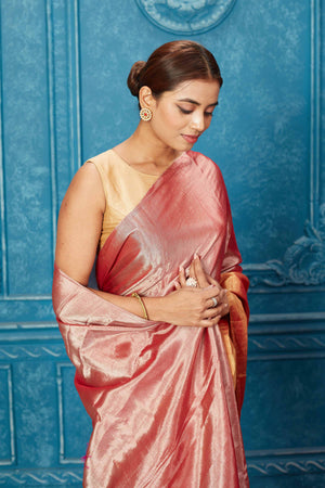 Shop pink and red tissue zari Banarasi sari online in USA. Keep your ethnic wardrobe up to date with latest designer sarees, pure silk sarees, Kanchipuram silk sarees, handwoven sarees, tussar silk sarees, embroidered sarees from Pure Elegance Indian saree store in USA.-closeup