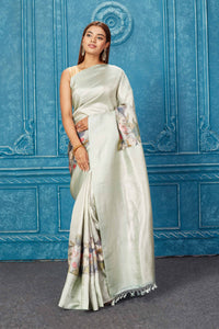 Shop stunning sage green floral Kanjeevaram sari online in USA. Keep your ethnic wardrobe up to date with latest designer sarees, pure silk sarees, Kanchipuram silk saris, handwoven sarees, tussar silk sarees, embroidered sarees from Pure Elegance Indian saree store in USA.-full view