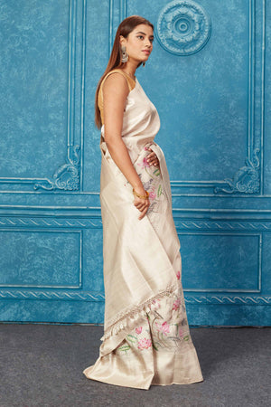 Shop stunning golden floral Kanjivaram silk saree online in USA . Keep your ethnic wardrobe up to date with latest designer sarees, pure silk sarees, Kanchipuram silk saris, handwoven sarees, tussar silk sarees, embroidered sarees from Pure Elegance Indian saree store in USA.-side