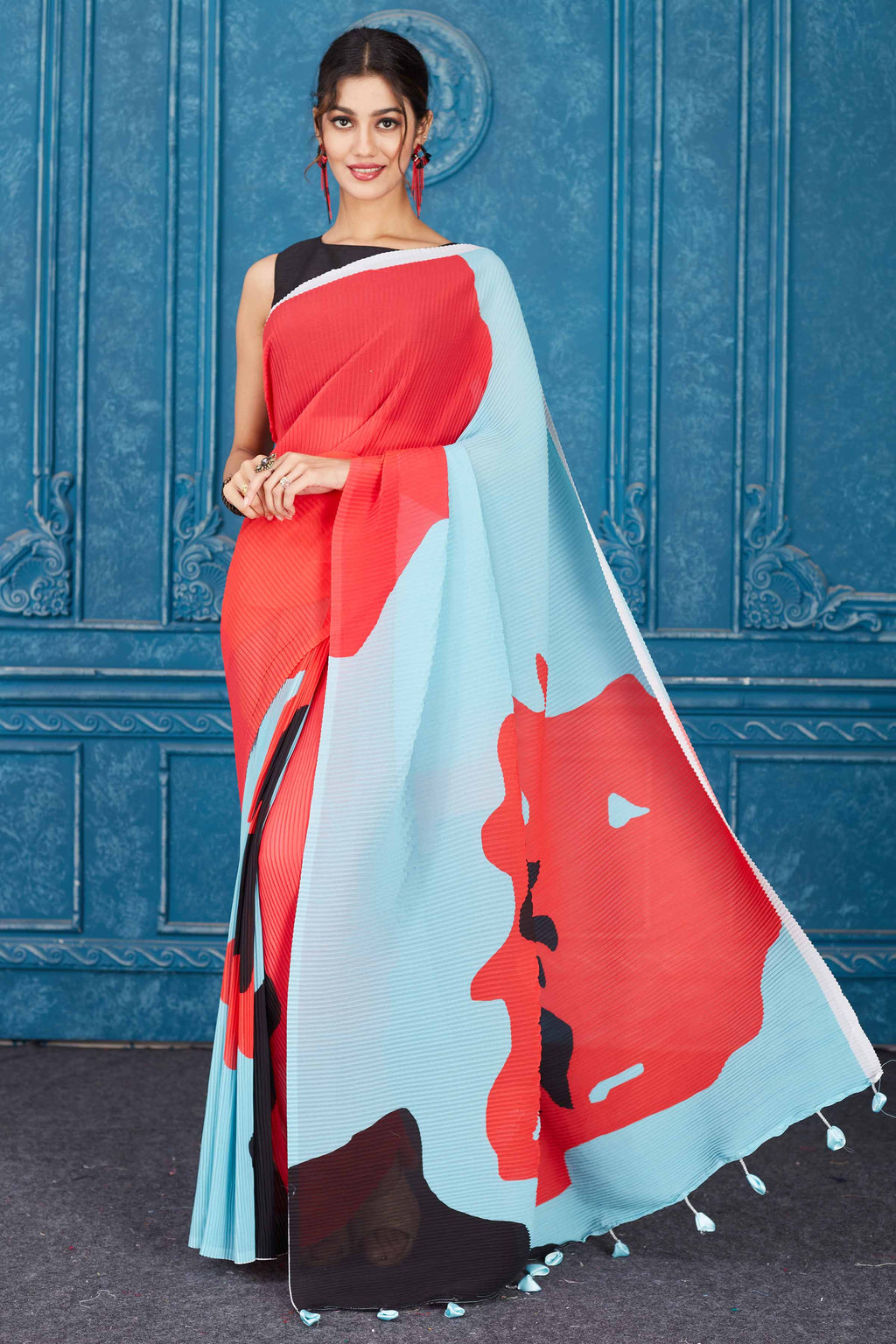 Buy red and powder blue abstract print crushed georgette saree online in USA. Look your best on festive occasions in latest designer sarees, pure silk saris, Kanchipuram silk sarees, handwoven sarees, tussar silk sarees, embroidered saris from Pure Elegance Indian clothing store in USA.-full view