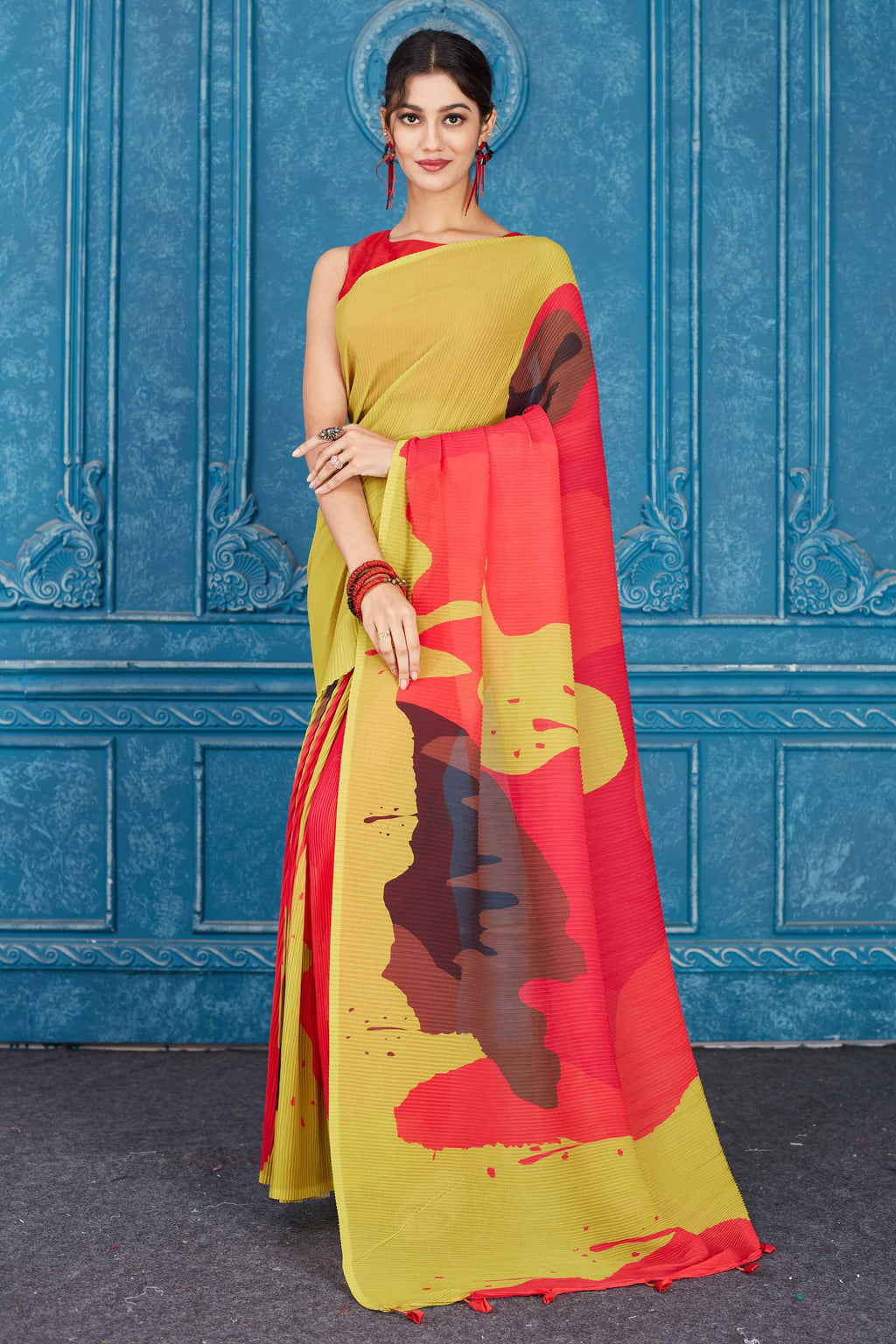 Shop beautiful olive green and red abstract print crushed georgette saree online in USA. Look your best on festive occasions in latest designer sarees, pure silk saris, Kanchipuram silk sarees, handwoven sarees, tussar silk sarees, embroidered saris from Pure Elegance Indian clothing store in USA.-full view