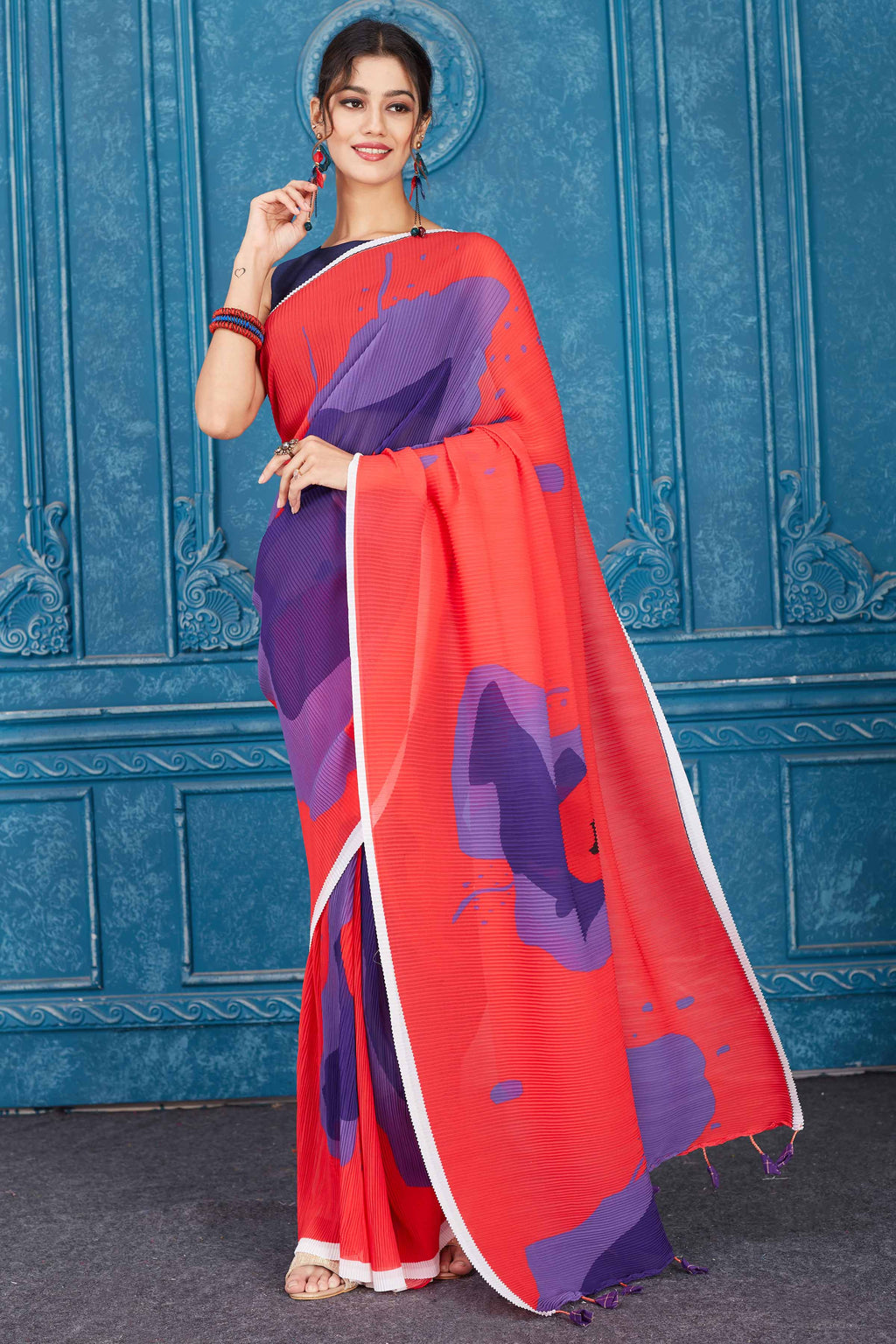 Shop beautiful red and purple abstract print crushed georgette sari online in USA. Look your best on festive occasions in latest designer sarees, pure silk saris, Kanchipuram silk sarees, handwoven sarees, tussar silk sarees, embroidered saris from Pure Elegance Indian clothing store in USA.-full view