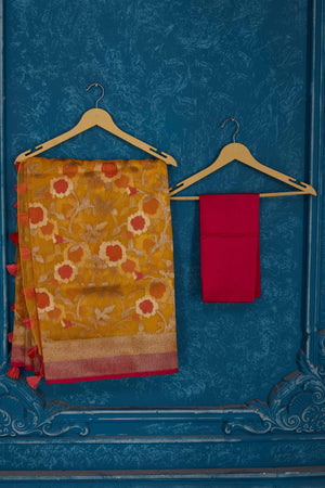 Shop yellow Kora Banarasi sari online in USA with pink border. Look your best on festive occasions in latest designer sarees, pure silk saris, Kanchipuram silk sarees, handwoven sarees, tussar silk sarees, embroidered saris from Pure Elegance Indian clothing store in USA.-blouse