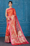 Shop red Kora Banarasi sari online in USA with pink border. Look your best on festive occasions in latest designer sarees, pure silk saris, Kanchipuram silk sarees, handwoven sarees, tussar silk sarees, embroidered saris from Pure Elegance Indian clothing store in USA.-full view
