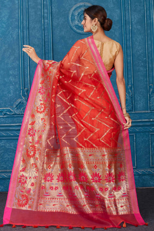 Shop red Kora Banarasi sari online in USA with pink border. Look your best on festive occasions in latest designer sarees, pure silk saris, Kanchipuram silk sarees, handwoven sarees, tussar silk sarees, embroidered saris from Pure Elegance Indian clothing store in USA.-back