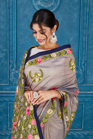 Shop stunning grey Phulkari work Kota saree online in USA. Look your best on festive occasions in latest designer sarees, pure silk saris, Kanchipuram silk sarees, handwoven sarees, tussar silk sarees, embroidered saris from Pure Elegance Indian clothing store in USA.-closeup