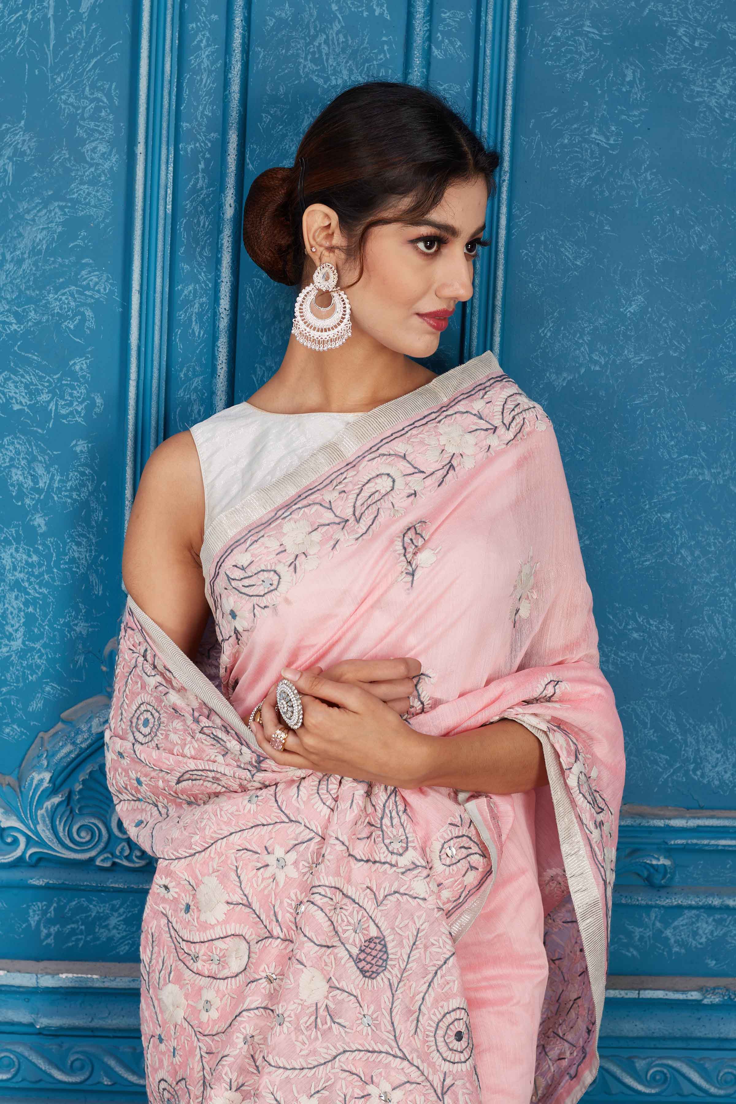 Buy beautiful powder pink Phulkari embroidery Kota saree online in USA. Look your best on festive occasions in latest designer sarees, pure silk saris, Kanchipuram silk sarees, handwoven sarees, tussar silk sarees, embroidered saris from Pure Elegance Indian clothing store in USA.-closeup