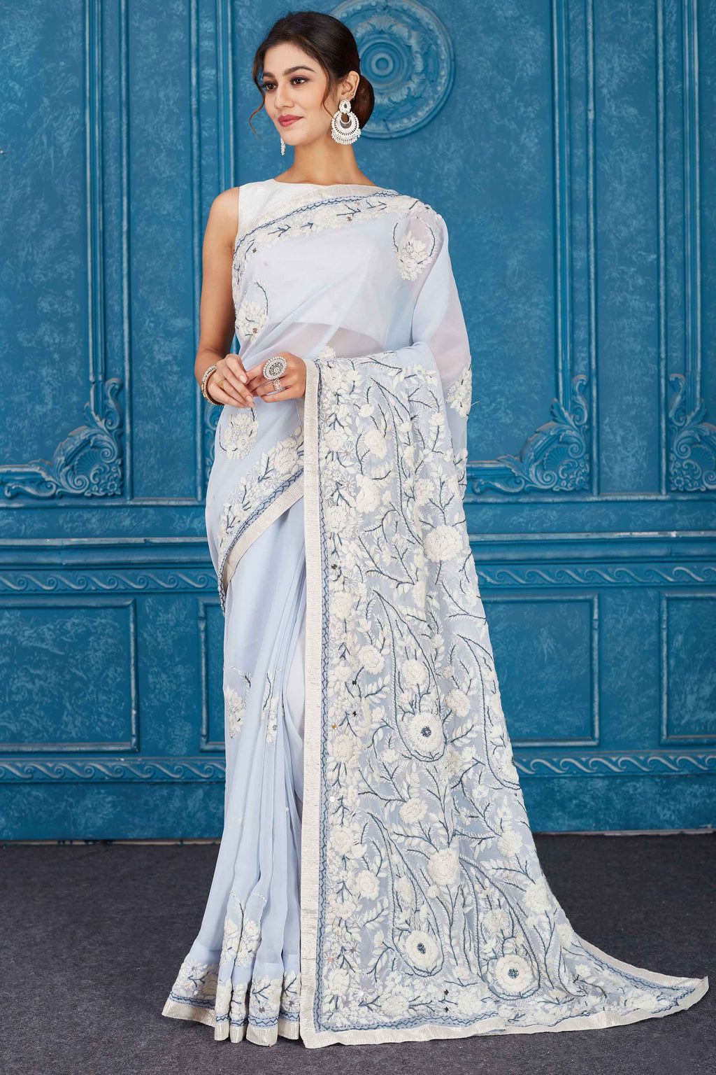 Shop stunning powder blue Phulkari embroidery Kota saree online in USA. Look your best on festive occasions in latest designer sarees, pure silk saris, Kanchipuram silk sarees, handwoven sarees, tussar silk sarees, embroidered saris from Pure Elegance Indian clothing store in USA.-full view