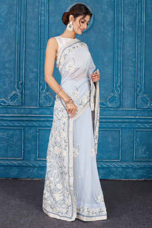 Shop stunning powder blue Phulkari embroidery Kota saree online in USA. Look your best on festive occasions in latest designer sarees, pure silk saris, Kanchipuram silk sarees, handwoven sarees, tussar silk sarees, embroidered saris from Pure Elegance Indian clothing store in USA.-side
