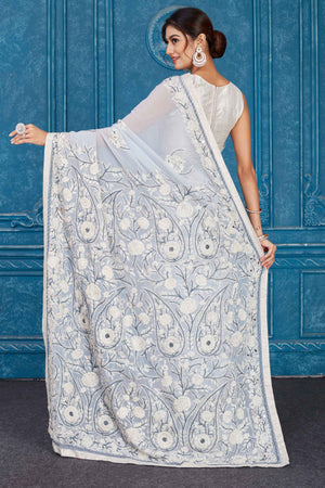 Shop stunning powder blue Phulkari embroidery Kota saree online in USA. Look your best on festive occasions in latest designer sarees, pure silk saris, Kanchipuram silk sarees, handwoven sarees, tussar silk sarees, embroidered saris from Pure Elegance Indian clothing store in USA.-back