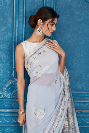 Shop stunning powder blue Phulkari embroidery Kota saree online in USA. Look your best on festive occasions in latest designer sarees, pure silk saris, Kanchipuram silk sarees, handwoven sarees, tussar silk sarees, embroidered saris from Pure Elegance Indian clothing store in USA.-closeup
