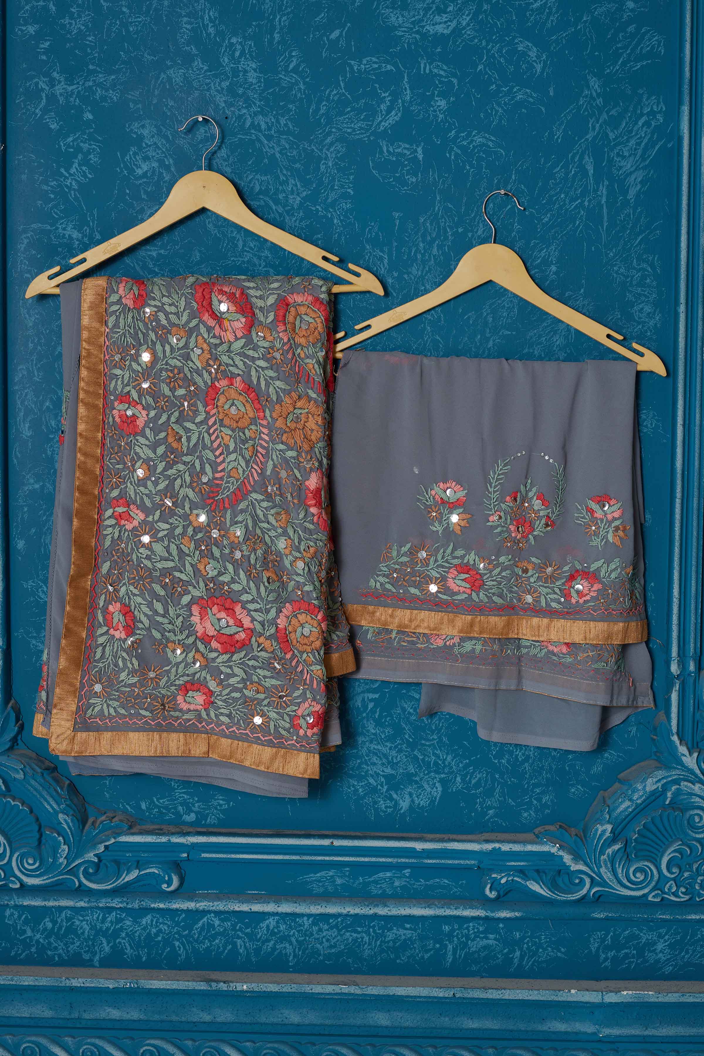 Buy beautiful grey Phulkari embroidery Kota saree online in USA with golden border. Look your best on festive occasions in latest designer sarees, pure silk saris, Kanchipuram silk sarees, handwoven sarees, tussar silk sarees, embroidered saris from Pure Elegance Indian clothing store in USA.-blouse