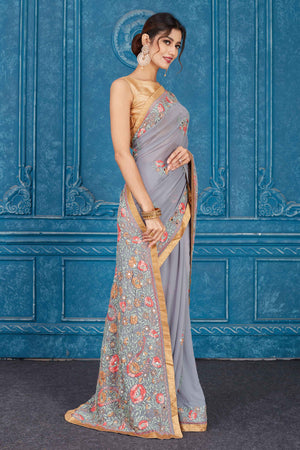 Buy beautiful grey Phulkari embroidery Kota saree online in USA with golden border. Look your best on festive occasions in latest designer sarees, pure silk saris, Kanchipuram silk sarees, handwoven sarees, tussar silk sarees, embroidered saris from Pure Elegance Indian clothing store in USA.-side