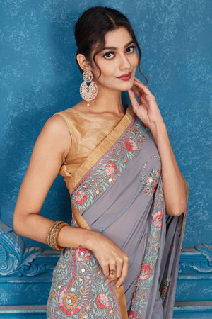 Buy beautiful grey Phulkari embroidery Kota saree online in USA with golden border. Look your best on festive occasions in latest designer sarees, pure silk saris, Kanchipuram silk sarees, handwoven sarees, tussar silk sarees, embroidered saris from Pure Elegance Indian clothing store in USA.-closeup