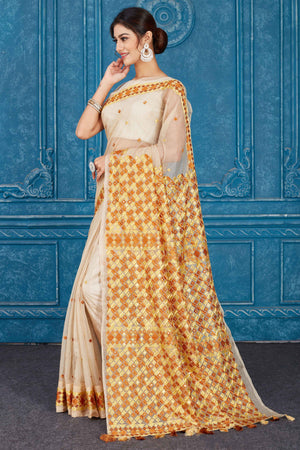 Shop cream Kota saree online in USA with Phulkari embroidery. Look your best on festive occasions in latest designer sarees, pure silk saris, Kanchipuram silk sarees, handwoven sarees, tussar silk sarees, embroidered saris from Pure Elegance Indian clothing store in USA.-pallu