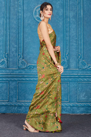 Buy olive green printed crepe chiffon sari online in USA. Look your best on festive occasions in latest designer sarees, pure silk saris, Kanchipuram silk sarees, handwoven sarees, tussar silk sarees, embroidered saris from Pure Elegance Indian clothing store in USA.-side