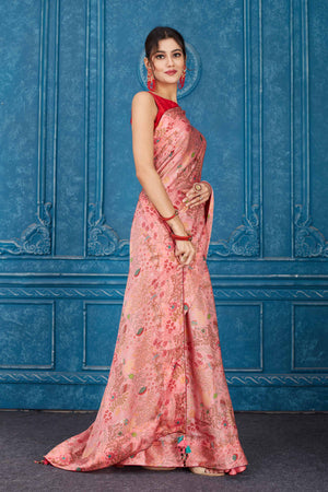 Shop stunning pink printed crepe chiffon sari online in USA. Look your best on festive occasions in latest designer sarees, pure silk saris, Kanchipuram silk sarees, handwoven sarees, tussar silk sarees, embroidered saris from Pure Elegance Indian clothing store in USA.-side
