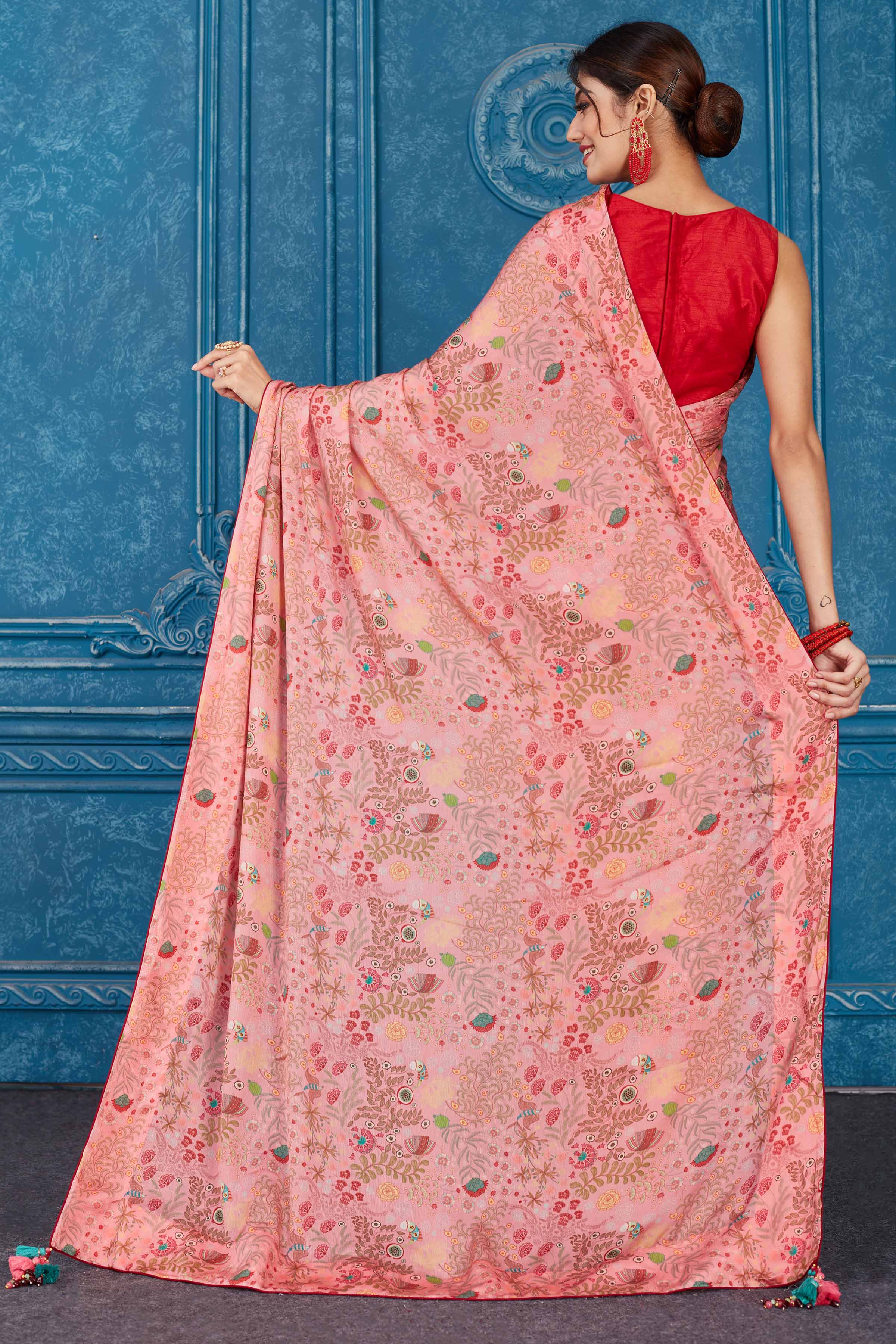 Shop stunning pink printed crepe chiffon sari online in USA. Look your best on festive occasions in latest designer sarees, pure silk saris, Kanchipuram silk sarees, handwoven sarees, tussar silk sarees, embroidered saris from Pure Elegance Indian clothing store in USA.-back