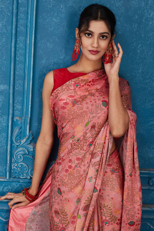 Shop stunning pink printed crepe chiffon sari online in USA. Look your best on festive occasions in latest designer sarees, pure silk saris, Kanchipuram silk sarees, handwoven sarees, tussar silk sarees, embroidered saris from Pure Elegance Indian clothing store in USA.-closeup