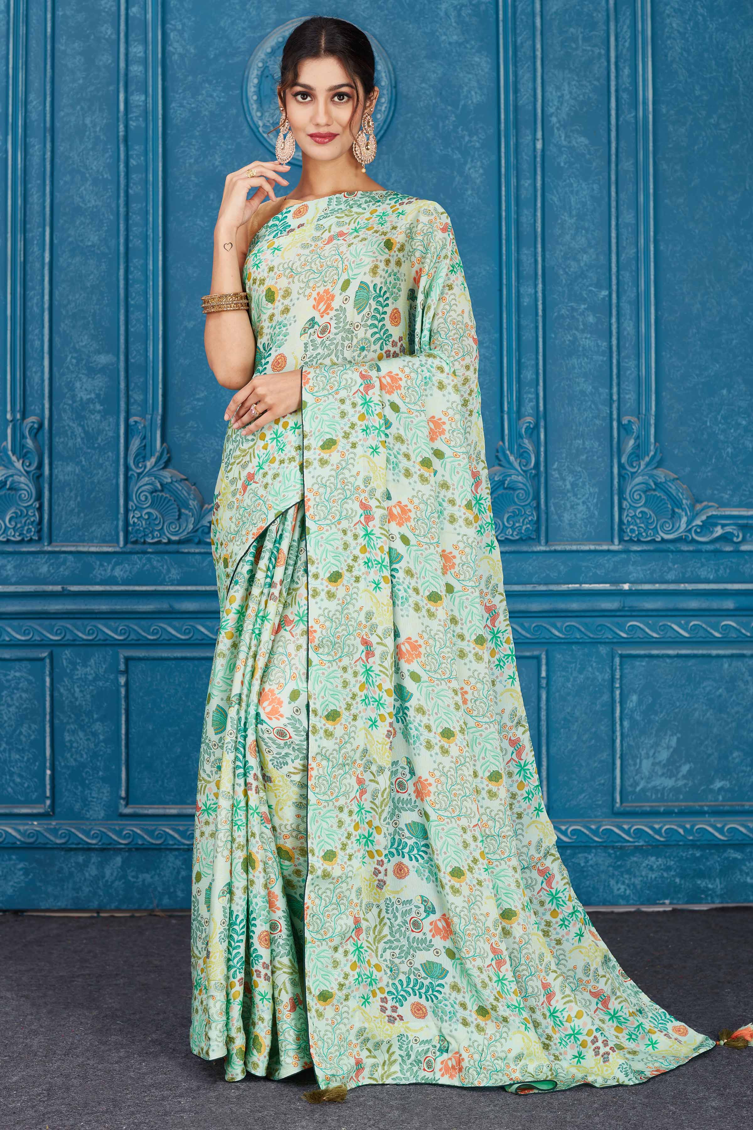 Shop mint green printed crepe chiffon sari online in USA. Look your best on festive occasions in latest designer sarees, pure silk saris, Kanchipuram silk sarees, handwoven sarees, tussar silk sarees, embroidered sarees from Pure Elegance Indian clothing store in USA.-full view