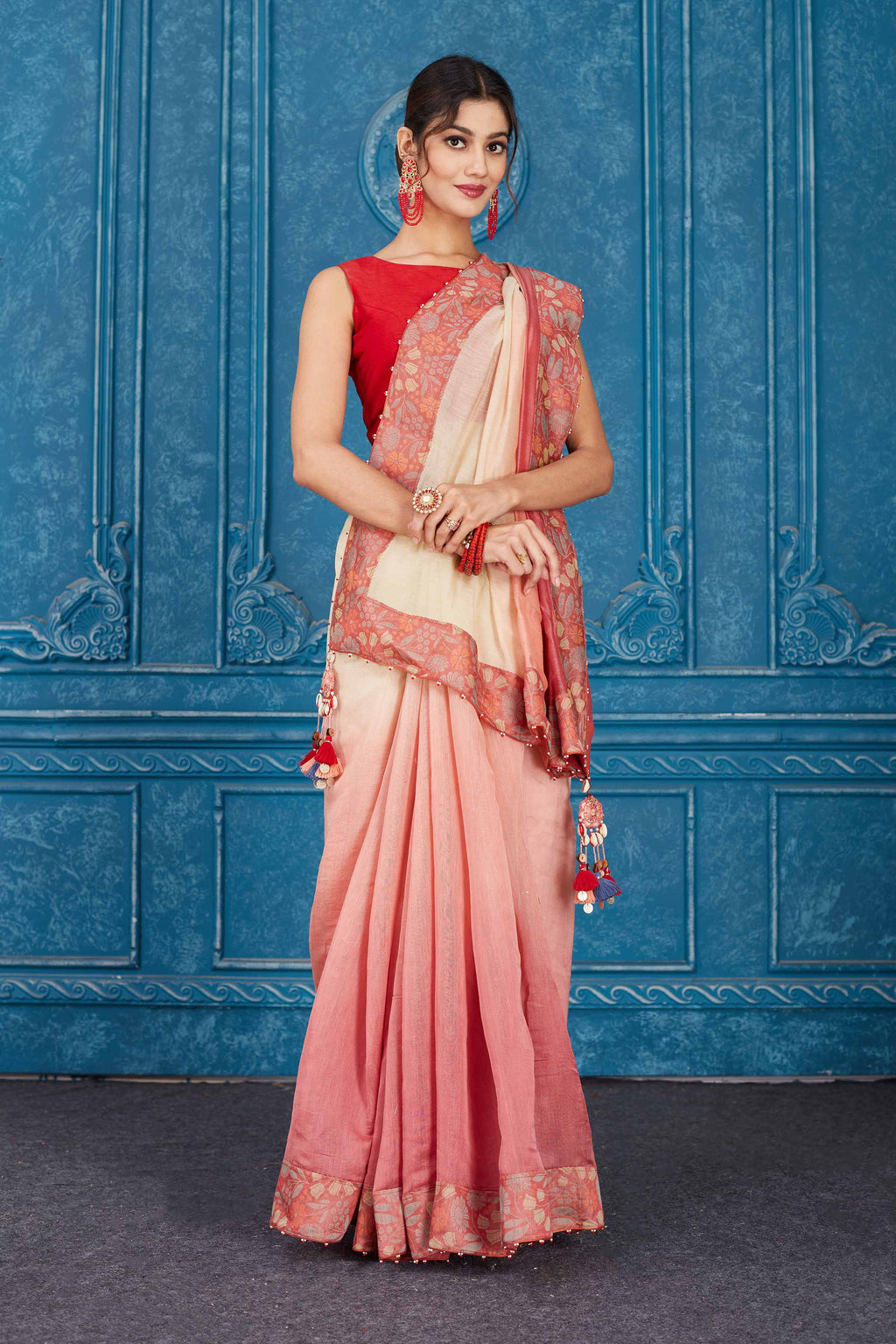Shop ombre pink linen sari online in USA with floral border. Look your best on festive occasions in latest designer sarees, pure silk saris, Kanchipuram silk sarees, handwoven sarees, tussar silk sarees, embroidered saris from Pure Elegance Indian clothing store in USA.-full view