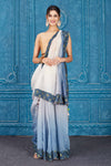Buy ombre blue linen sari online in USA with floral border. Look your best on festive occasions in latest designer sarees, pure silk saris, Kanchipuram silk sarees, handwoven sarees, tussar silk sarees, embroidered saris from Pure Elegance Indian clothing store in USA.-full view