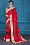 Shop beautiful blood red chanderi silk saree online in USA with patch mirror work border. Look your best on festive occasions in latest designer sarees, pure silk saris, Kanchipuram silk sarees, handwoven sarees, tussar silk sarees, embroidered saris from Pure Elegance Indian clothing store in USA.-full view