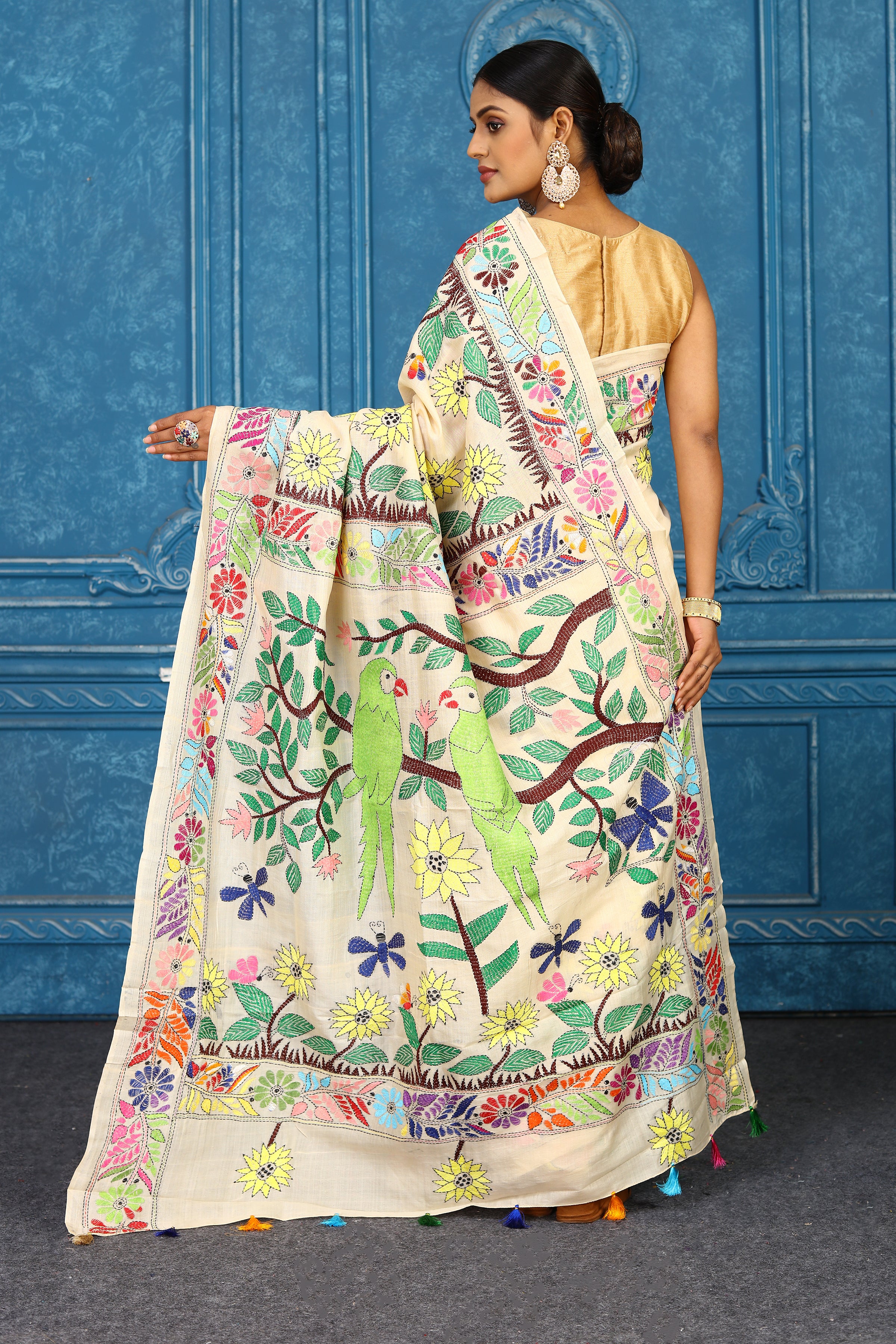 Shop cream tussar silk sari online in USA with floral Kantha embroidery. Look your best on festive occasions in latest designer sarees, pure silk sarees, Kanchipuram sarees, handwoven sarees, tussar silk sarees, embroidered sarees from Pure Elegance Indian clothing store in USA.-back