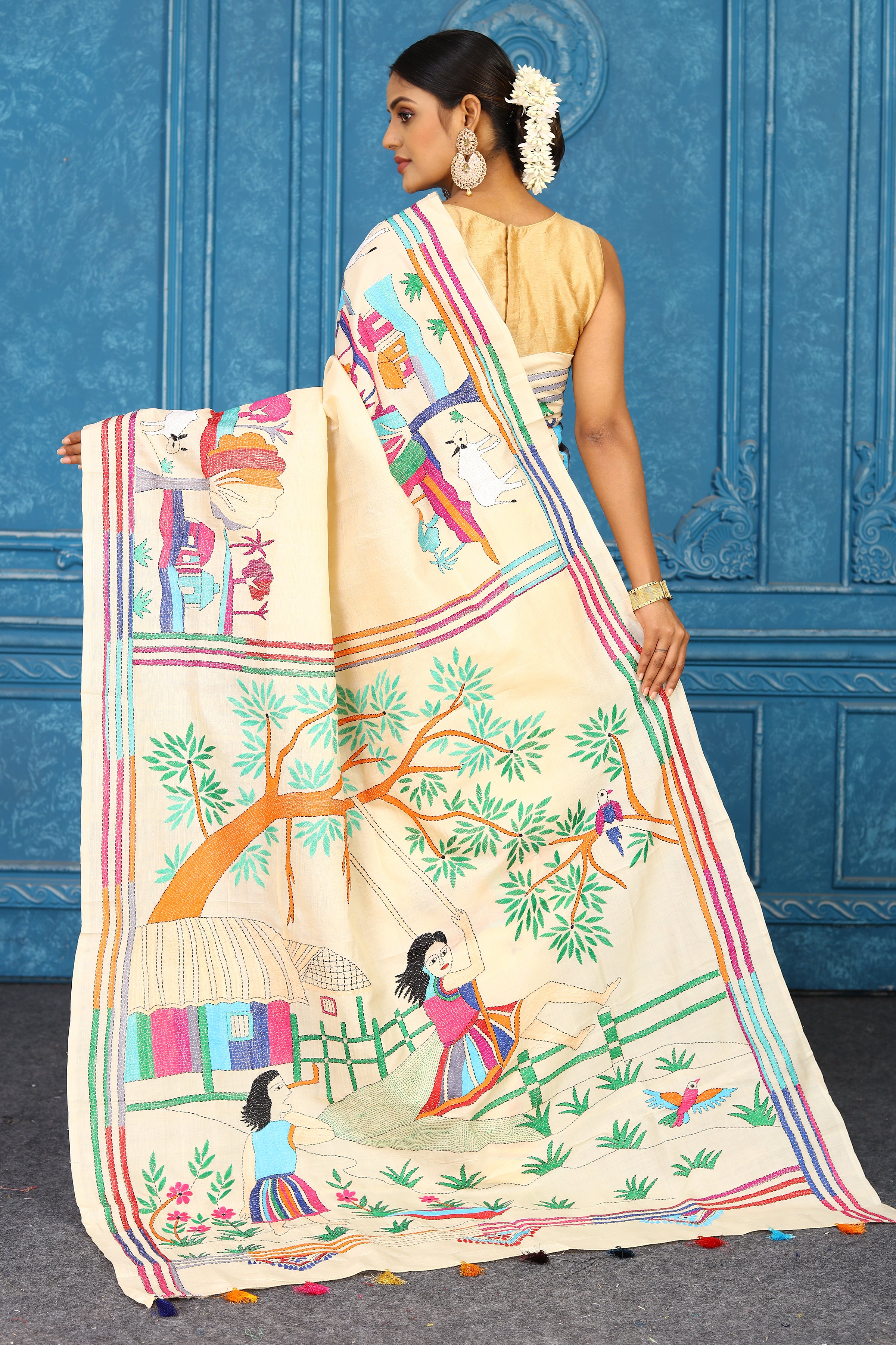 Buy cream tussar silk saree online in USA with multicolor Kantha work. Look your best on festive occasions in latest designer sarees, pure silk sarees, Kanchipuram sarees, handwoven sarees, tussar silk sarees, embroidered sarees from Pure Elegance Indian clothing store in USA.-back