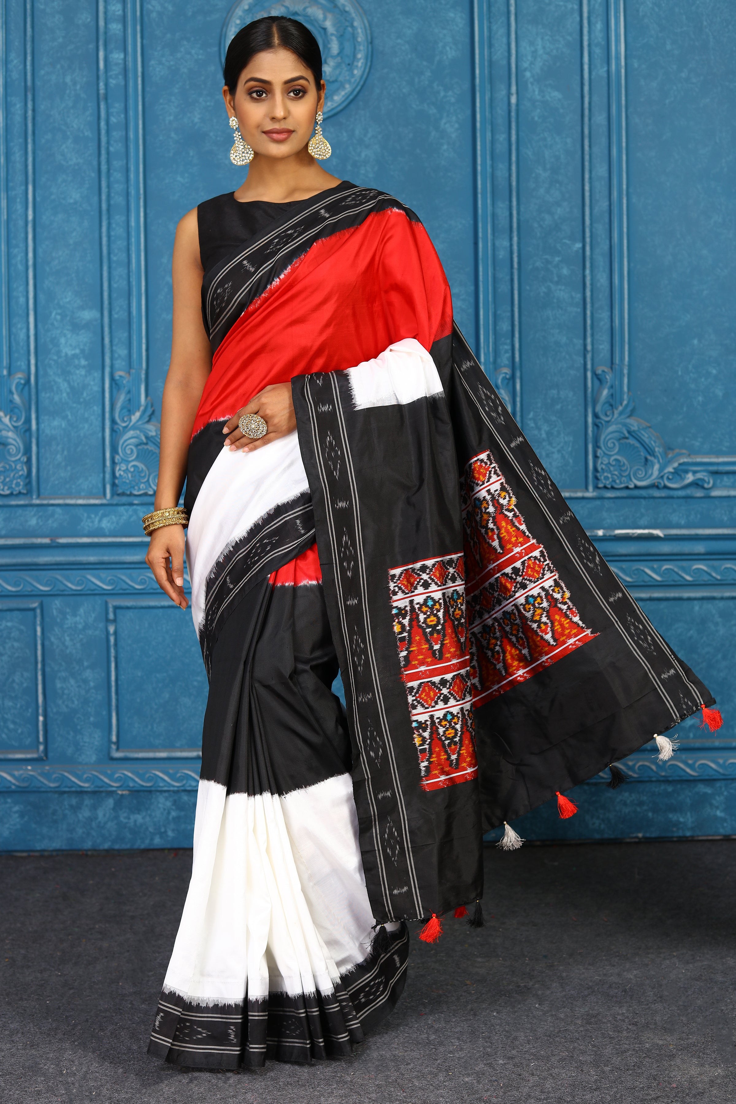 Shop black, white and red pochampally silk ikkat sari online in USA. Look your best on festive occasions in latest designer sarees, pure silk sarees, Kanchipuram sarees, handwoven sarees, tussar silk sarees, embroidered sarees from Pure Elegance Indian clothing store in USA.-full view