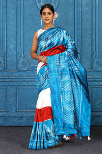 Buy cream and turquoise blue pochampally silk ikkat sari online in USA. Look your best on festive occasions in latest designer sarees, pure silk sarees, Kanchipuram sarees, handwoven sarees, tussar silk sarees, embroidered sarees from Pure Elegance Indian clothing store in USA.-full view