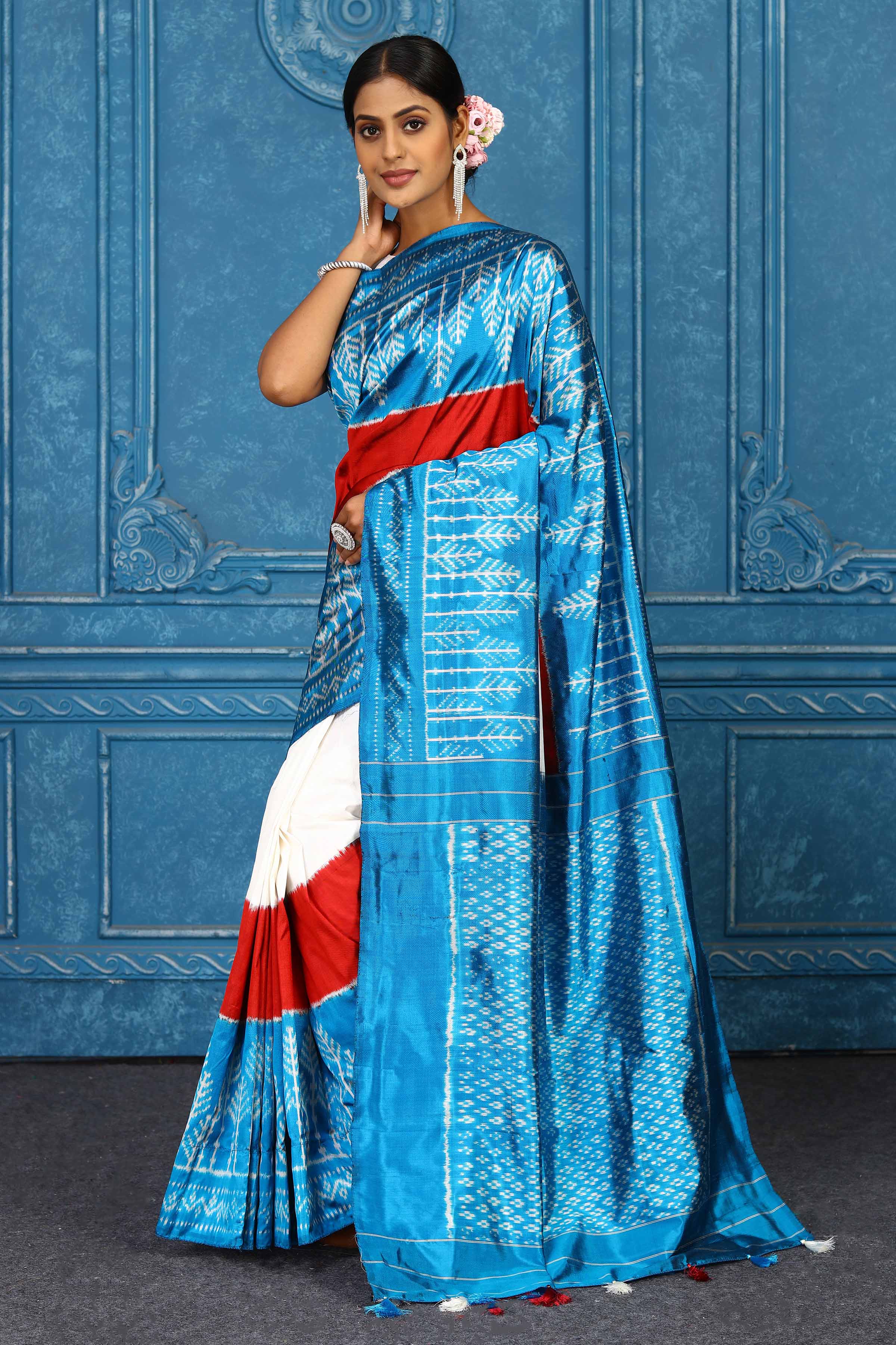 Buy cream and turquoise blue pochampally silk ikkat sari online in USA. Look your best on festive occasions in latest designer sarees, pure silk sarees, Kanchipuram sarees, handwoven sarees, tussar silk sarees, embroidered sarees from Pure Elegance Indian clothing store in USA.-pallu