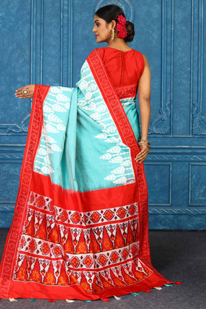 Shop stunning light blue pochampally silk ikkat saree online in USA. Look your best on festive occasions in latest designer sarees, pure silk sarees, Kanchipuram sarees, handwoven sarees, tussar silk sarees, embroidered sarees from Pure Elegance Indian clothing store in USA.-back