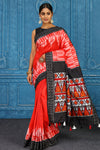 Buy red pochampally silk ikkat saree online in USA with black border. Look your best on festive occasions in latest designer sarees, pure silk sarees, Kanchipuram sarees, handwoven sarees, tussar silk sarees, embroidered sarees from Pure Elegance Indian clothing store in USA.-full view