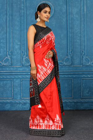 Buy red pochampally silk ikkat saree online in USA with black border. Look your best on festive occasions in latest designer sarees, pure silk sarees, Kanchipuram sarees, handwoven sarees, tussar silk sarees, embroidered sarees from Pure Elegance Indian clothing store in USA.-side