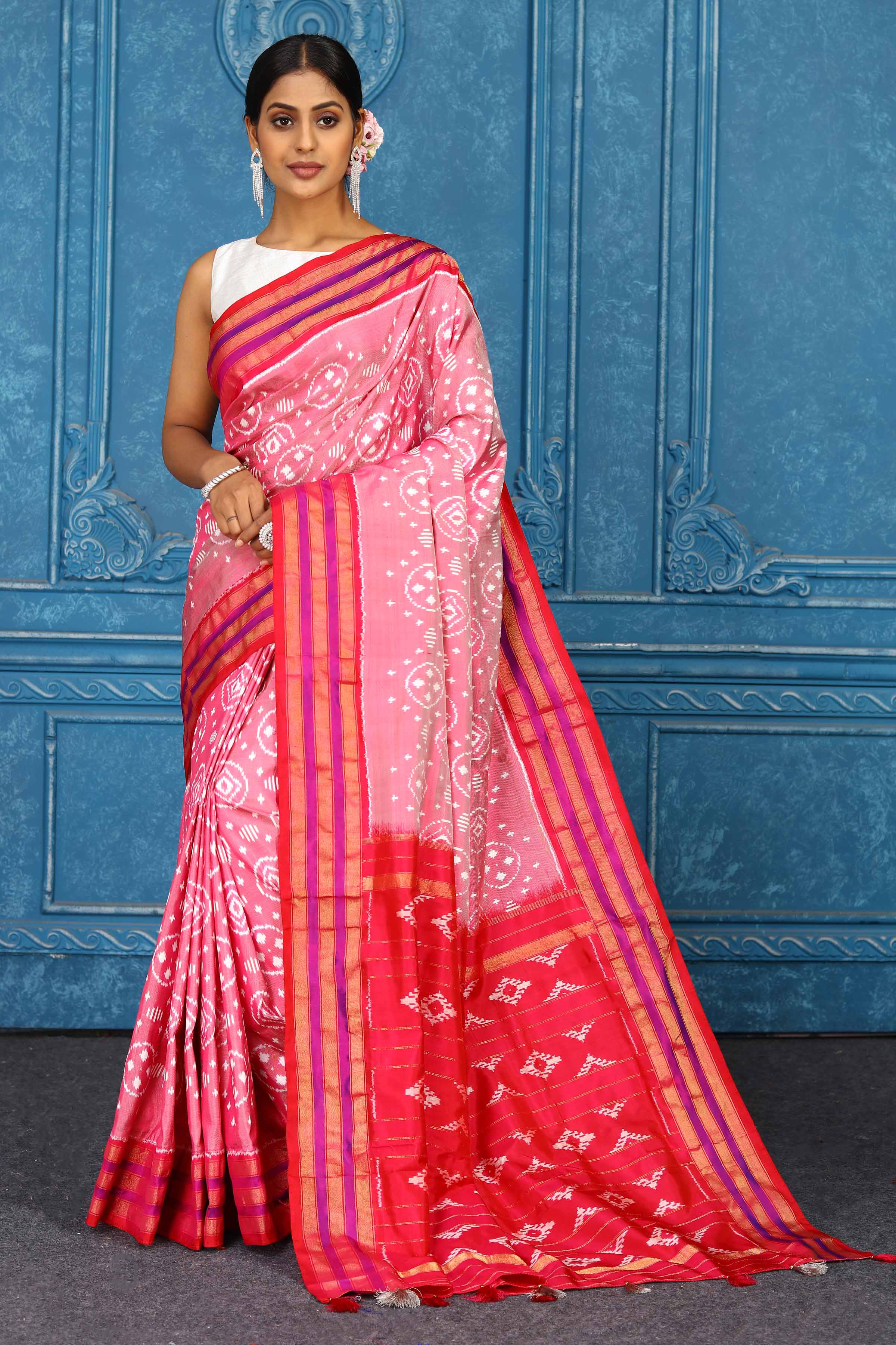 Buy pink pochampally silk ikkat saree online in USA with red border. Look your best on festive occasions in latest designer sarees, pure silk sarees, Kanchipuram sarees, handwoven sarees, tussar silk sarees, embroidered sarees from Pure Elegance Indian clothing store in USA.-full view