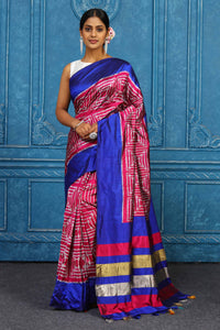 Shop pink pochampally silk ikkat saree online in USA with blue border. Look your best on festive occasions in latest designer sarees, pure silk sarees, Kanchipuram sarees, handwoven sarees, tussar silk sarees, embroidered sarees from Pure Elegance Indian clothing store in USA.-full view