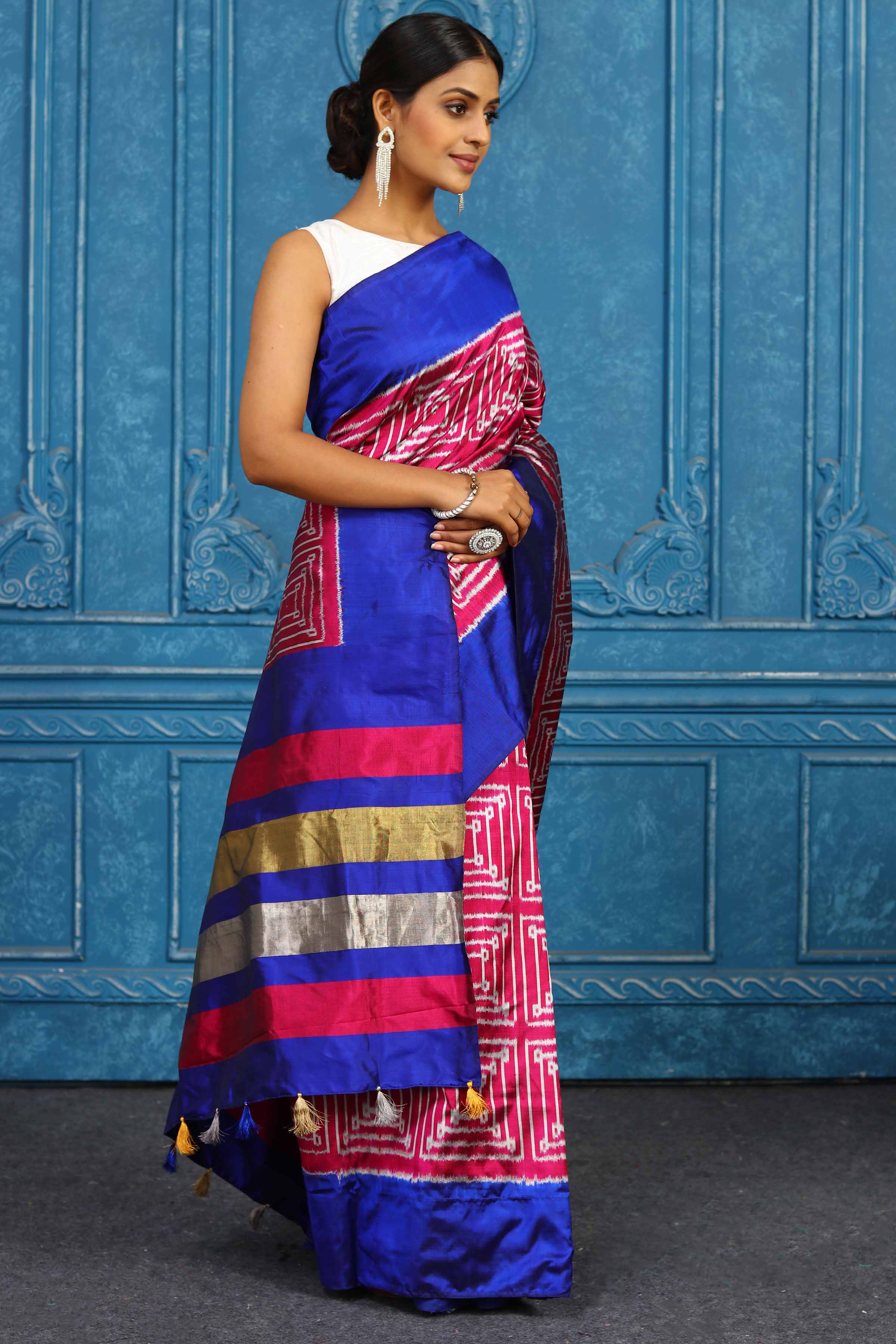 Shop pink pochampally silk ikkat saree online in USA with blue border. Look your best on festive occasions in latest designer sarees, pure silk sarees, Kanchipuram sarees, handwoven sarees, tussar silk sarees, embroidered sarees from Pure Elegance Indian clothing store in USA.-pallu