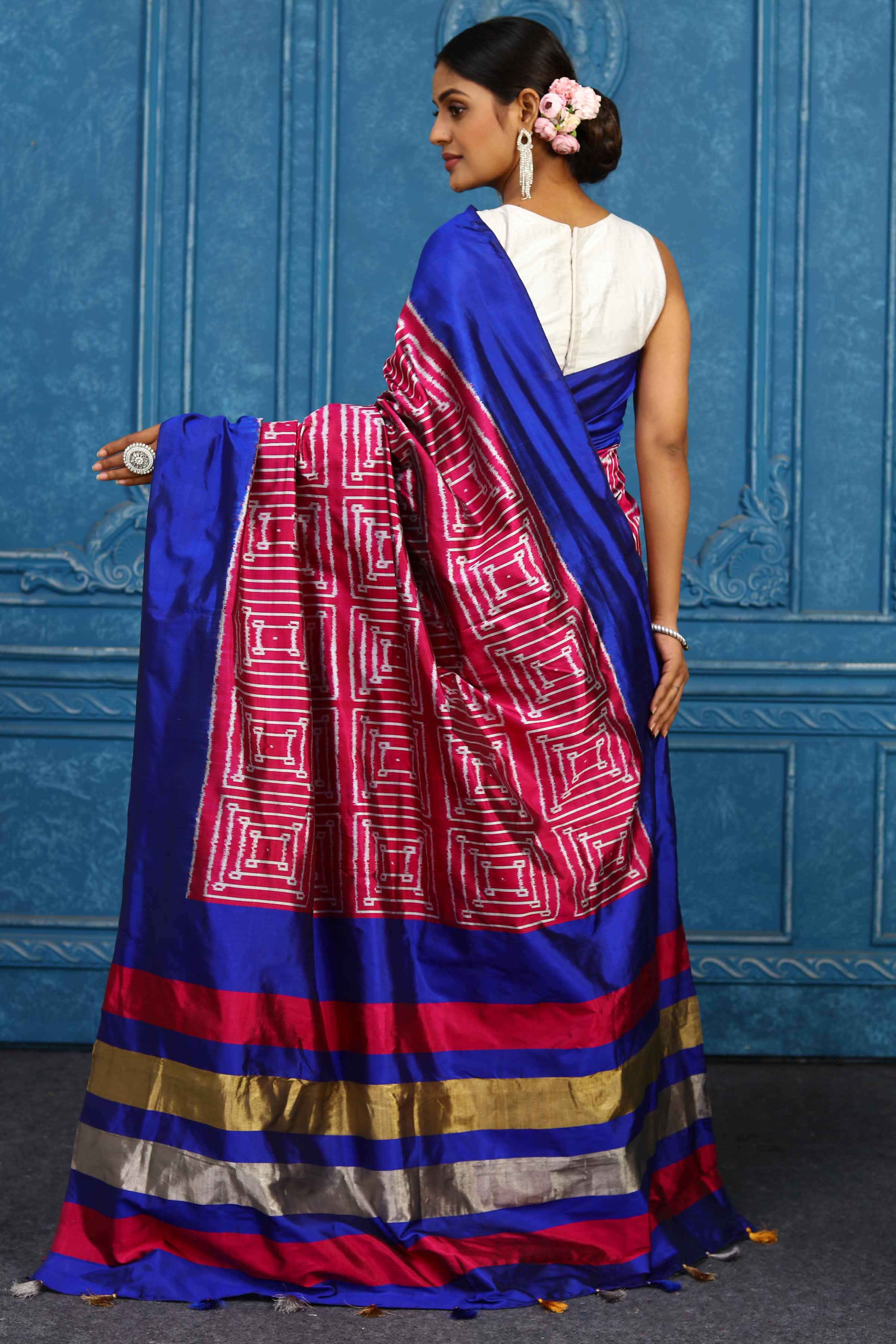 Shop pink pochampally silk ikkat saree online in USA with blue border. Look your best on festive occasions in latest designer sarees, pure silk sarees, Kanchipuram sarees, handwoven sarees, tussar silk sarees, embroidered sarees from Pure Elegance Indian clothing store in USA.-back