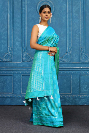 Buy stunning blue pochampally silk ikkat saree online in USA. Look your best on festive occasions in latest designer sarees, pure silk sarees, Kanchipuram sarees, handwoven sarees, tussar silk sarees, embroidered sarees from Pure Elegance Indian clothing store in USA.-side