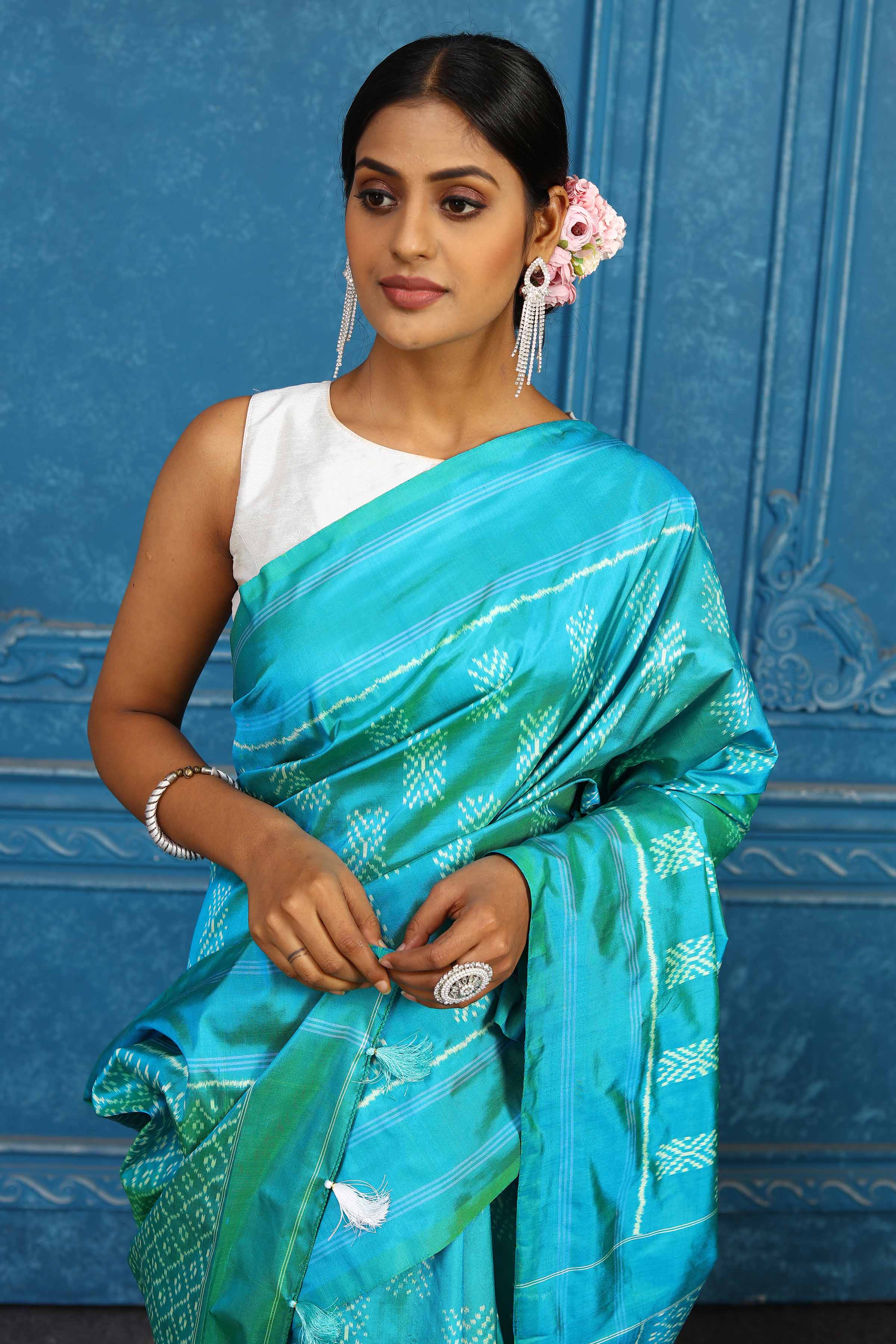 Buy stunning blue pochampally silk ikkat saree online in USA. Look your best on festive occasions in latest designer sarees, pure silk sarees, Kanchipuram sarees, handwoven sarees, tussar silk sarees, embroidered sarees from Pure Elegance Indian clothing store in USA.-closeup