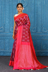 Buy maroon pochampally silk ikkat saree online in USA with red border. Look your best on festive occasions in latest designer sarees, pure silk sarees, Kanchipuram sarees, handwoven sarees, tussar silk sarees, embroidered sarees from Pure Elegance Indian clothing store in USA.-full view
