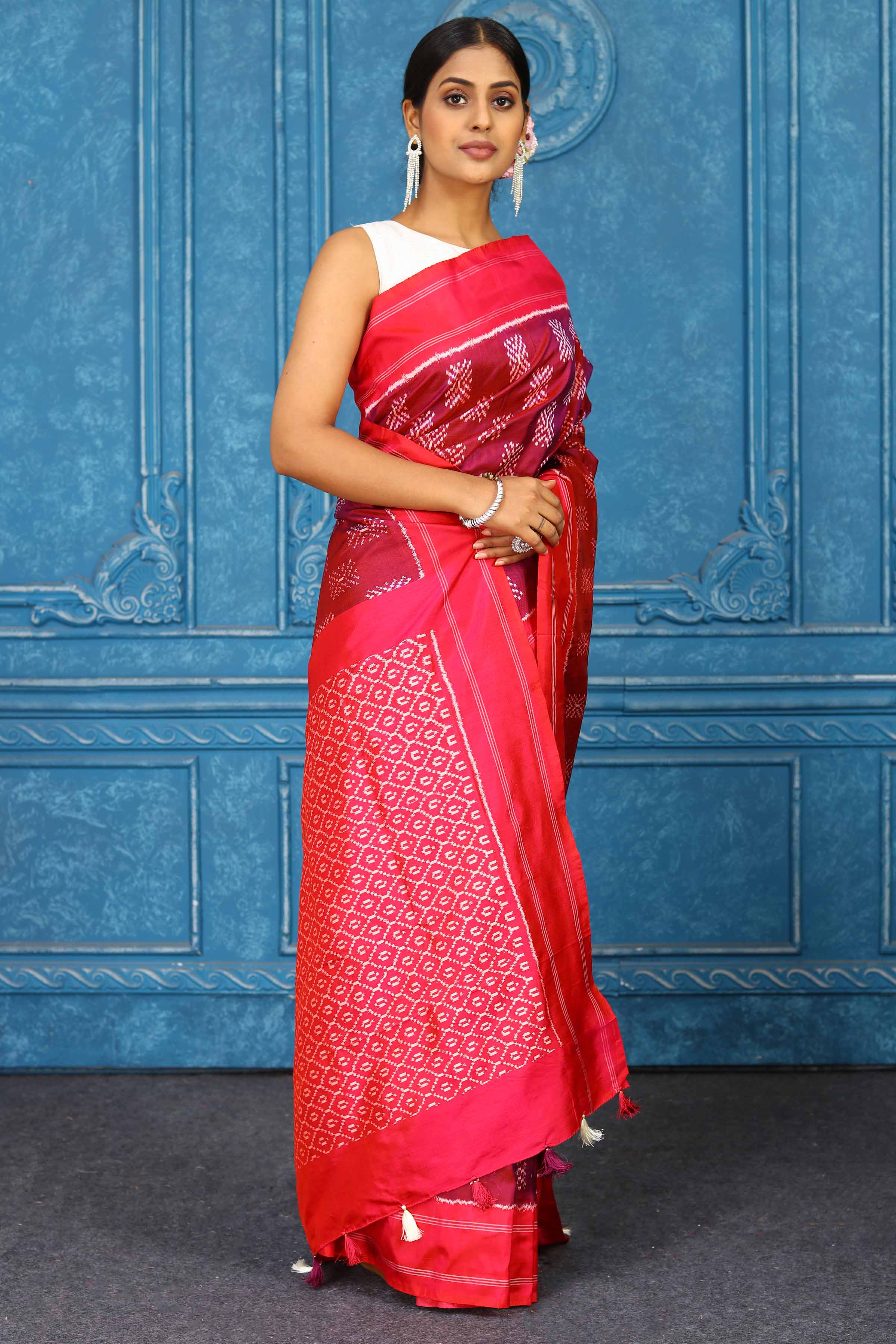 Buy maroon pochampally silk ikkat saree online in USA with red border. Look your best on festive occasions in latest designer sarees, pure silk sarees, Kanchipuram sarees, handwoven sarees, tussar silk sarees, embroidered sarees from Pure Elegance Indian clothing store in USA.-side