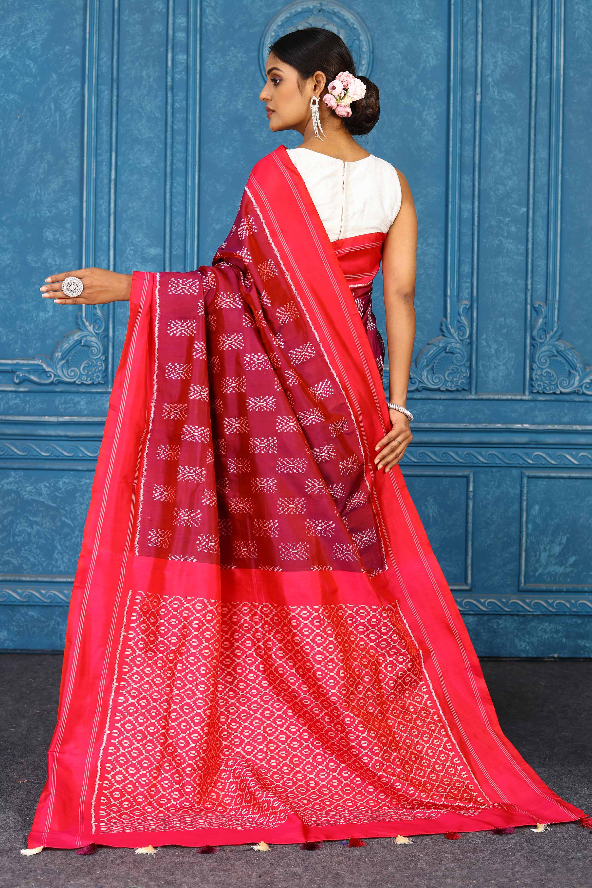 Buy maroon pochampally silk ikkat saree online in USA with red border. Look your best on festive occasions in latest designer sarees, pure silk sarees, Kanchipuram sarees, handwoven sarees, tussar silk sarees, embroidered sarees from Pure Elegance Indian clothing store in USA.-back