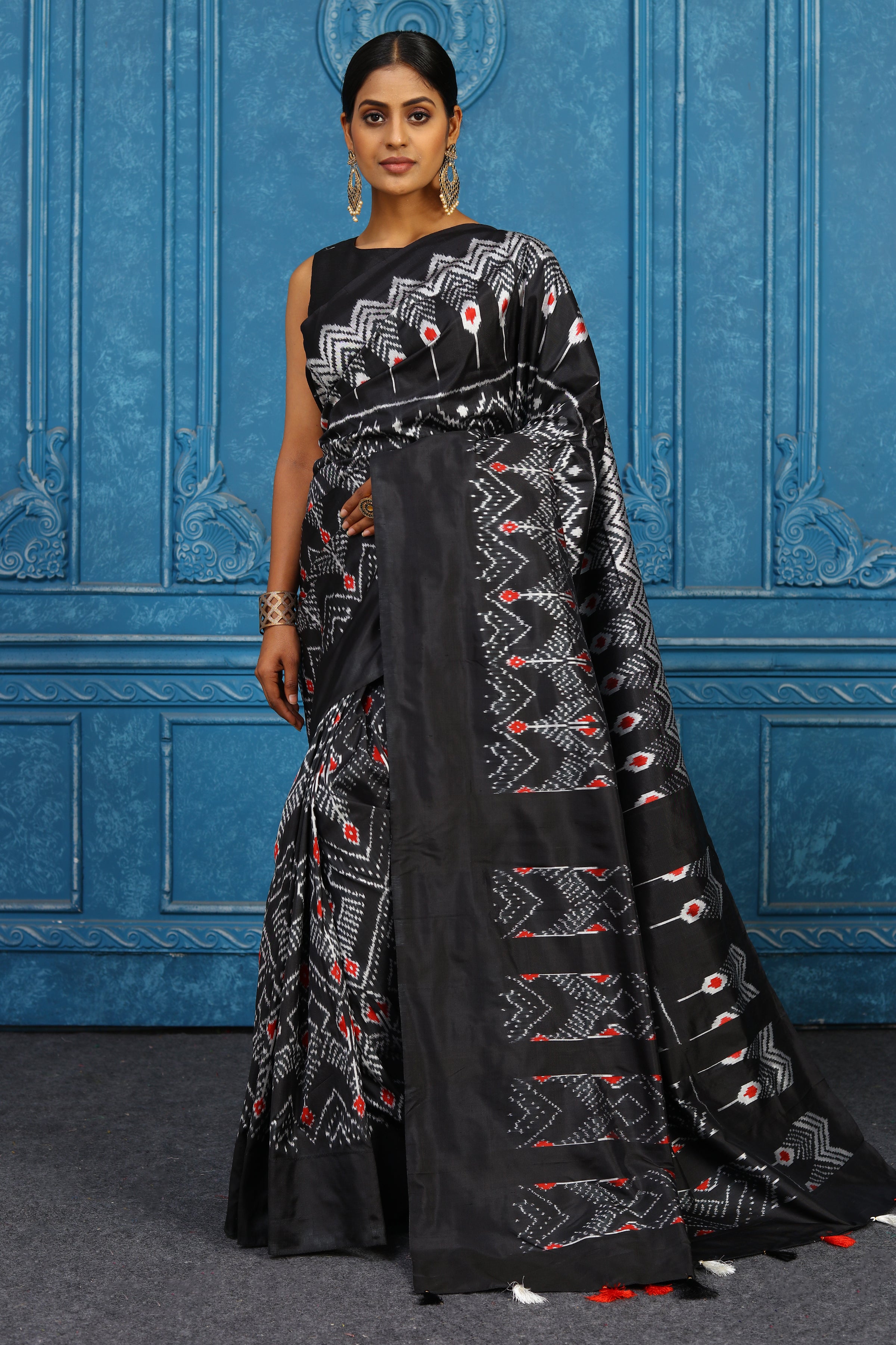 Shop black and white pochampally silk ikkat sari online in USA. Look your best on festive occasions in latest designer sarees, pure silk sarees, Kanchipuram sarees, handwoven sarees, tussar silk sarees, embroidered sarees from Pure Elegance Indian clothing store in USA.-full view