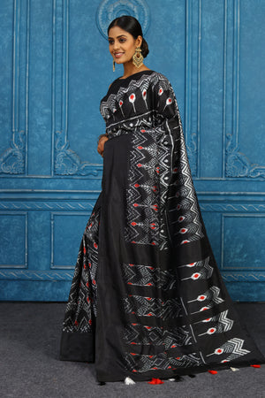 Shop black and white pochampally silk ikkat sari online in USA. Look your best on festive occasions in latest designer sarees, pure silk sarees, Kanchipuram sarees, handwoven sarees, tussar silk sarees, embroidered sarees from Pure Elegance Indian clothing store in USA.-pallu